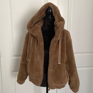 Brand new, never worn, faux fur jacket from Zara